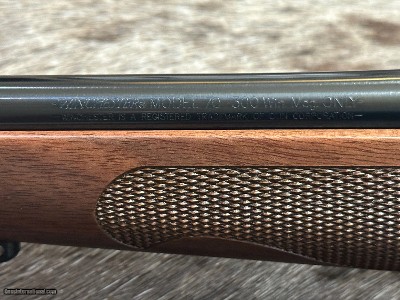 FREE SAFARI, NEW WINCHESTER MODEL 70 FEATHERWEIGHT 300 WIN MAG RIFLE 24