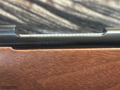 FREE SAFARI, NEW WINCHESTER MODEL 70 FEATHERWEIGHT 300 WIN MAG RIFLE 24