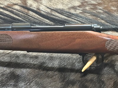 FREE SAFARI, NEW WINCHESTER MODEL 70 FEATHERWEIGHT 300 WIN MAG RIFLE 24