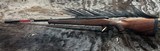 FREE SAFARI, NEW WINCHESTER MODEL 70 FEATHERWEIGHT 300 WIN MAG RIFLE 22