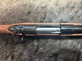 FREE SAFARI, NEW WINCHESTER MODEL 70 FEATHERWEIGHT 300 WIN MAG RIFLE 22