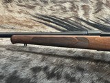 FREE SAFARI, NEW WINCHESTER MODEL 70 FEATHERWEIGHT 300 WIN MAG RIFLE 22