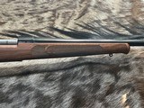 FREE SAFARI, NEW WINCHESTER MODEL 70 FEATHERWEIGHT 300 WIN MAG RIFLE 22