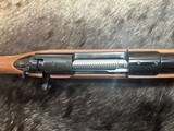 FREE SAFARI, NEW WINCHESTER MODEL 70 FEATHERWEIGHT 300 WIN MAG RIFLE 22