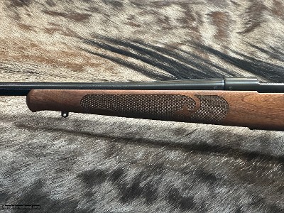 FREE SAFARI, NEW WINCHESTER MODEL 70 FEATHERWEIGHT 300 WIN MAG RIFLE 24