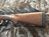 FREE SAFARI, NEW WINCHESTER MODEL 70 FEATHERWEIGHT 300 WIN MAG RIFLE 22