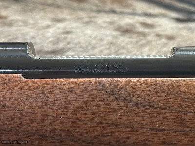FREE SAFARI, NEW WINCHESTER MODEL 70 FEATHERWEIGHT 300 WIN MAG RIFLE 24