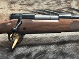 FREE SAFARI, NEW WINCHESTER MODEL 70 FEATHERWEIGHT 300 WIN MAG RIFLE 22