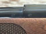 FREE SAFARI, NEW WINCHESTER MODEL 70 FEATHERWEIGHT 300 WIN MAG RIFLE 22