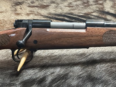 FREE SAFARI, NEW WINCHESTER MODEL 70 FEATHERWEIGHT 300 WIN MAG RIFLE 24