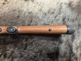 FREE SAFARI, NEW WINCHESTER MODEL 70 FEATHERWEIGHT 300 WIN MAG RIFLE 22