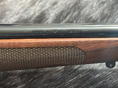 FREE SAFARI, NEW WINCHESTER MODEL 70 FEATHERWEIGHT 300 WIN MAG RIFLE 24