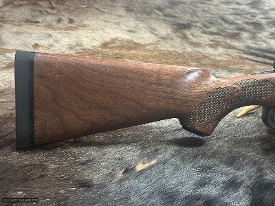 FREE SAFARI, NEW WINCHESTER MODEL 70 FEATHERWEIGHT 300 WIN MAG RIFLE 22