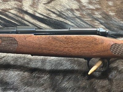 FREE SAFARI, NEW WINCHESTER MODEL 70 FEATHERWEIGHT 300 WIN MAG RIFLE 24