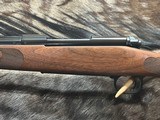 FREE SAFARI, NEW WINCHESTER MODEL 70 FEATHERWEIGHT 300 WIN MAG RIFLE 22
