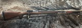 FREE SAFARI, NEW WINCHESTER MODEL 70 FEATHERWEIGHT 300 WIN MAG RIFLE 22