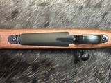 FREE SAFARI, NEW WINCHESTER MODEL 70 FEATHERWEIGHT 300 WIN MAG RIFLE 22