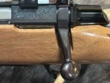 FREE SAFARI,
LEFT HAND BROWNING A-BOLT MEDALLION 300 WIN MAG 26