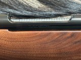 FREE SAFARI, NEW WINCHESTER MODEL 70 SUPER GRADE 7mm REM MAG 26