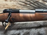 FREE SAFARI, NEW WINCHESTER MODEL 70 SUPER GRADE 7mm REM MAG 26