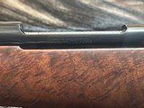 FREE SAFARI, NEW WINCHESTER MODEL 70 SUPER GRADE 7mm REM MAG 26