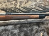 FREE SAFARI, NEW WINCHESTER MODEL 70 SUPER GRADE 338 WIN MAG 26