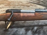 FREE SAFARI, NEW WINCHESTER MODEL 70 SUPER GRADE 338 WIN MAG 26