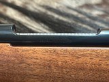 FREE SAFARI, NEW WINCHESTER MODEL 70 SUPER GRADE 338 WIN MAG 26