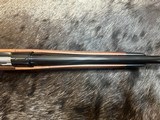 FREE SAFARI, NEW WINCHESTER MODEL 70 SUPER GRADE 338 WIN MAG 26