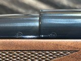 FREE SAFARI, NEW WINCHESTER MODEL 70 SUPER GRADE 338 WIN MAG 26