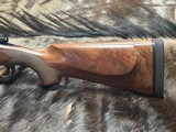 FREE SAFARI, NEW WINCHESTER MODEL 70 SUPER GRADE 338 WIN MAG 26