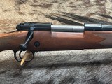 FREE SAFARI, NEW WINCHESTER MODEL 70 SUPER GRADE 338 WIN MAG 26
