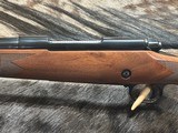 FREE SAFARI, NEW WINCHESTER MODEL 70 SUPER GRADE 338 WIN MAG 26