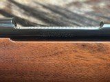 FREE SAFARI, NEW WINCHESTER MODEL 70 SUPER GRADE 338 WIN MAG 26