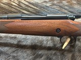 FREE SAFARI, NEW WINCHESTER MODEL 70 SUPER GRADE 7mm REM MAG 26