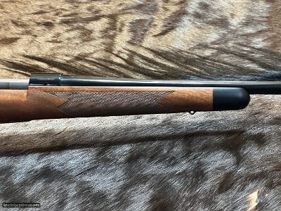 FREE SAFARI, NEW WINCHESTER MODEL 70 SUPER GRADE 7mm REM MAG 26