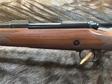 FREE SAFARI, NEW WINCHESTER MODEL 70 SUPER GRADE 7mm REM MAG 26