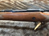 FREE SAFARI, NEW WINCHESTER MODEL 70 SUPER GRADE 7mm REM MAG 26