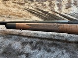 FREE SAFARI, NEW WINCHESTER MODEL 70 SUPER GRADE 264 WIN MAG 26