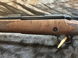 FREE SAFARI, NEW WINCHESTER MODEL 70 SUPER GRADE 264 WIN MAG 26