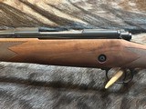 FREE SAFARI, NEW WINCHESTER MODEL 70 SUPER GRADE 264 WIN MAG 26