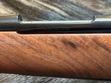 FREE SAFARI, NEW WINCHESTER MODEL 70 SUPER GRADE 338 WIN MAG 26