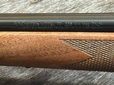 FREE SAFARI, NEW WINCHESTER MODEL 70 SUPER GRADE 338 WIN MAG 26