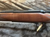 FREE SAFARI, NEW WINCHESTER MODEL 70 ALASKAN 300 WIN MAG 25