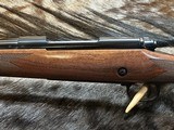 FREE SAFARI, NEW WINCHESTER MODEL 70 SUPER GRADE 264 WIN MAG 26