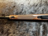 FREE SAFARI, NEW WINCHESTER MODEL 70 SUPER GRADE 300 WIN MAG 26