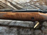FREE SAFARI, NEW WINCHESTER MODEL 70 SUPER GRADE 300 WIN MAG 26