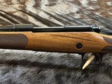 FREE SAFARI, NEW WINCHESTER MODEL 70 SUPER GRADE FRENCH WALNUT 7MM REM MAG 26