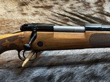 FREE SAFARI, NEW WINCHESTER MODEL 70 SUPER GRADE FRENCH WALNUT 7MM REM MAG 26