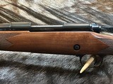 FREE SAFARI, NEW WINCHESTER MODEL 70 SUPER GRADE 300 WSM 24